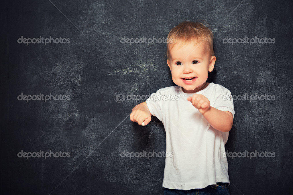 Baby child and empty Blackboard Stock Photo by ©evgenyataman 39515583