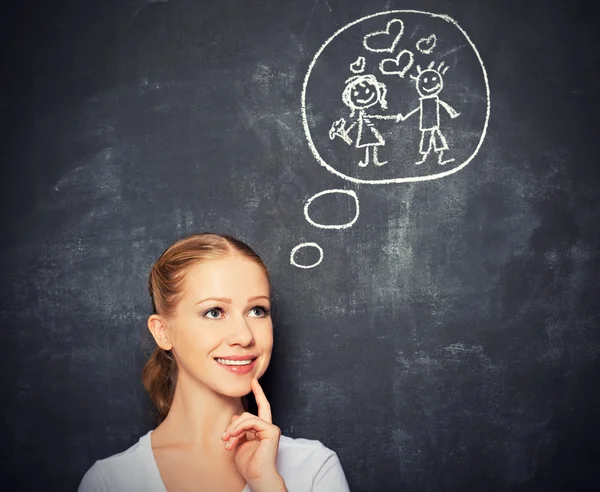 Concept. woman dreams about love and marriage drawing on a chalk — Stock Photo, Image