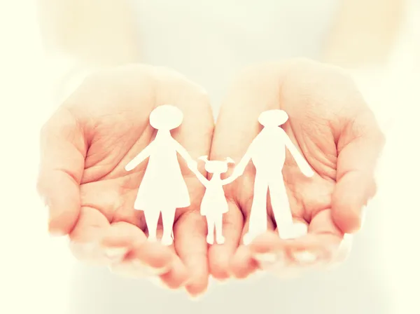 Concept. paper figures of family in hands — Stock Photo, Image