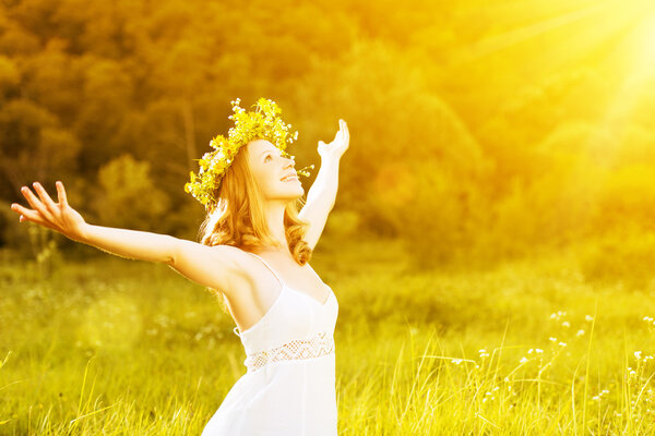 happy woman in wreath outdoors summer enjoying life