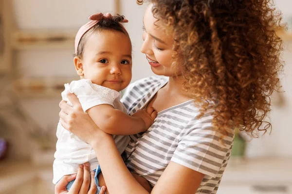 Happy Cheerful African American Mother Holds Laughing Baby Daughter Her — Stock Photo, Image