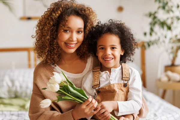 Happy African American Mom Tulips Smiling Embracing Son Gratitude While — Stock Photo, Image