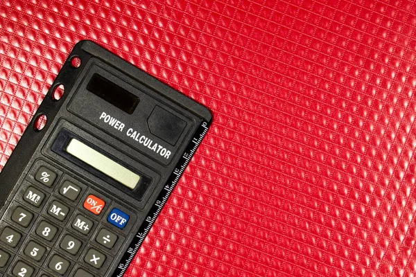 Czarny Kalkulator Skórzanym Tle — Zdjęcie stockowe