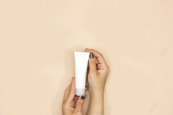 Closeup Hand Woman Holding Beauty Cosmetics Tube Branding Mock Isolated — стоковое фото