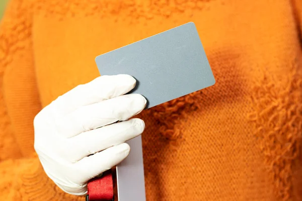 Woman Holding Grey Card Red Strap Photographers Tool Determining Correct — Stock Photo, Image