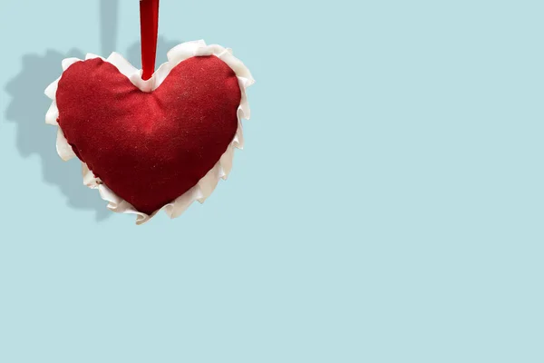 hanging red heart, health care, love, organ donation, mindfulness, wellbeing, family insurance and CSR concept, world heart day, world health day, National Organ Donor Day, praying concept