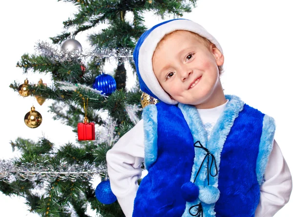 Junge mit Weihnachtsmannmütze — Stockfoto