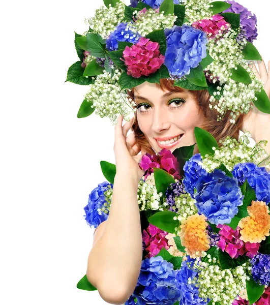 Portrait of a young woman wearing a crown of flowers — Stock Photo, Image