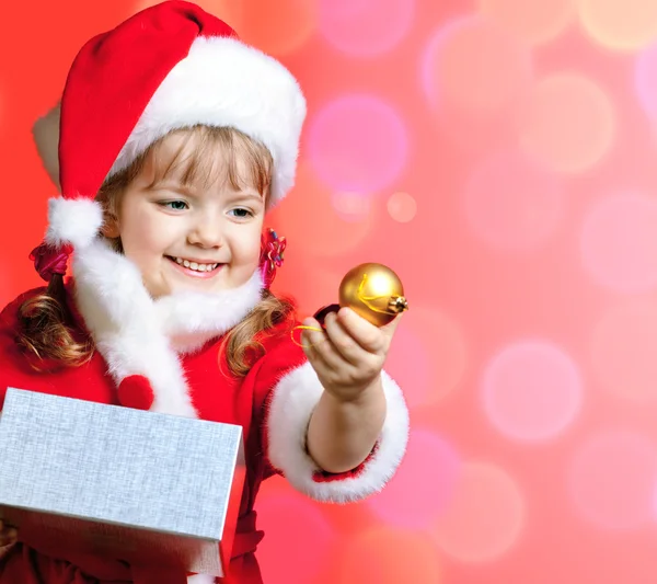 Liten flicka klädd i santa claus — Stockfoto