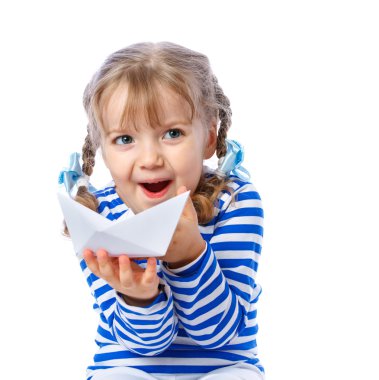 portrait of a little girl holding a paper boat on a white backgr clipart