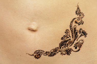 Mehendi on the stomach clipart