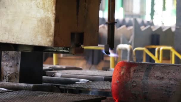 Red-hot billet is moving on the conveyor pipe — Stock Video