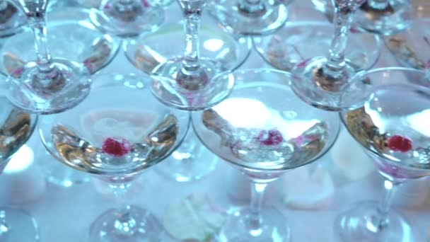 Champagne with cherries in a pyramid — Stock Video
