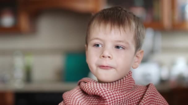 A sick child licks his fingers in sour cream — Stock Video