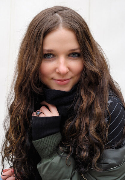 Portrait of teenage girl with long hair, close-up.