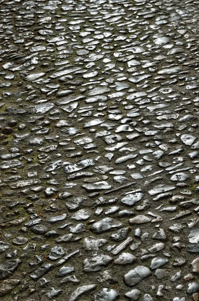 Pavimento trillado de la antigua carretera — Foto de Stock