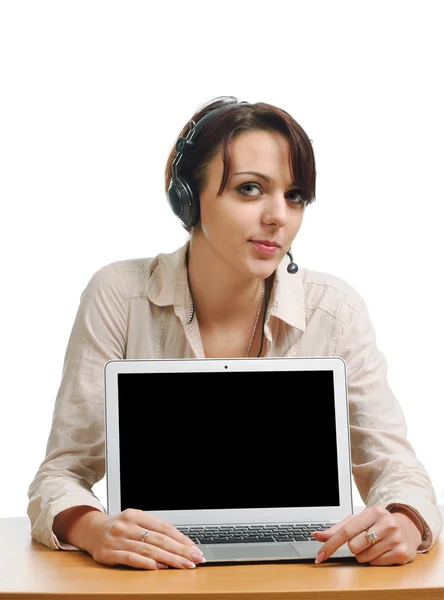 Cheerful woman in the headset and with a computer — Stock Photo, Image