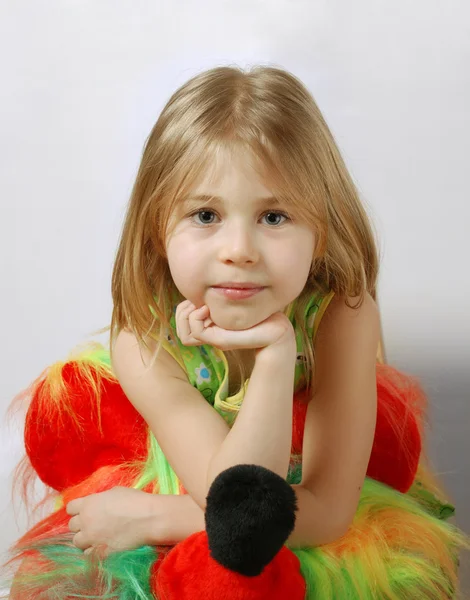 Attentive scrutiny of little blond girl — Stock Photo, Image