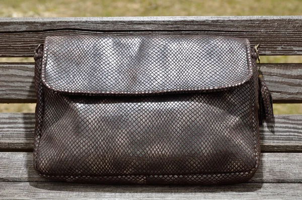 Female handbag on the bench — Stock Photo, Image
