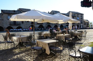 Outdoor cafe in the ancient square clipart