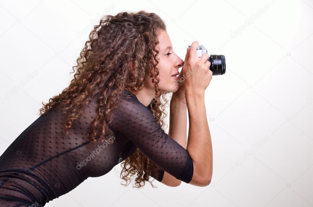 Pretty woman photographing