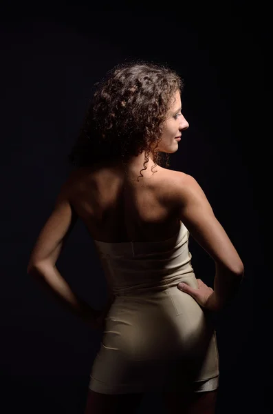 Frizzy woman in the cocktail dress — Stock Photo, Image