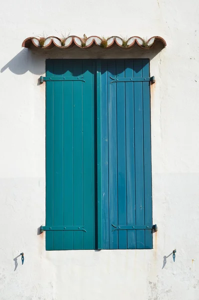 Vintage window with closed shutters — Stock Photo, Image