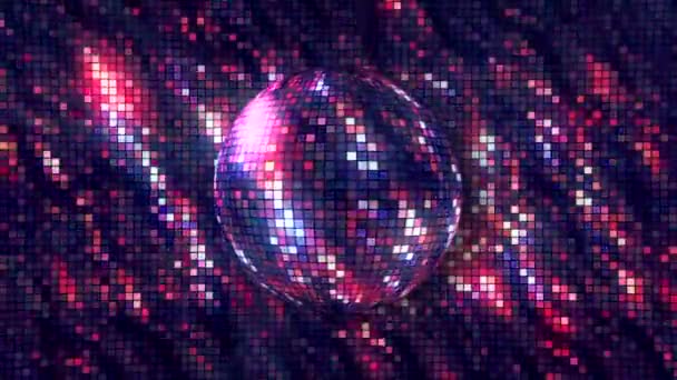 Bright background with rotating disco ball. Motion. Disco background with brilliant iridescent colors and rotating ball. Disco ball with beautiful color shimmers on repeating background — Stock Video
