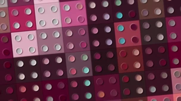 Cubi lampeggianti colorati con punti. Mozione. Piazze colorate con puntini lampeggiano in diversi colori. Sfondo rotante di quadrati lego colorati — Video Stock