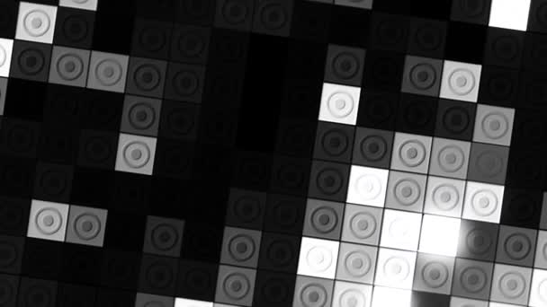 Gloeiende mozaïektegels knipperen willekeurig en roteren. Beweging. Bewegende monochrome vierkanten met de illustratie van cirkels op een zwarte achtergrond. — Stockvideo