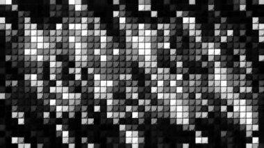 Soyut monokrom parıldayan mozaik arka plan, kusursuz döngü. Hareket. Parlayan kare şekillerden oluşan siyah beyaz bir duvar..