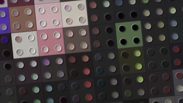 Geometrisk yta med roterande rutor animerad bakgrund, sömlös loop. Rörelse. Flerfärgad ljus vägg av blinkande kubikformer med små prickar. — Stockvideo