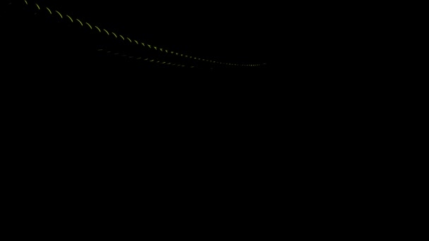 Random optical fibers are woven into a large spiral, 3d effect. Design. Metal wires twisting on a black background. — Stock Video