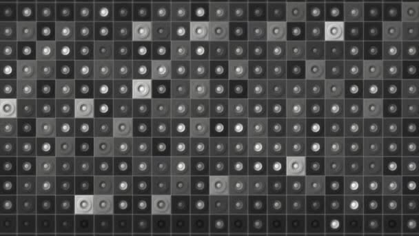 Digital animation of mosaic pattern wall, seamless loop. Motion. Monochrome blinking squares with small dots in the middle. — Stock Video