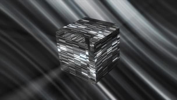 Abstraction in monochrome. Motion. Gray background with white rays and shadows.A gray cube in 3d that gives off different gray colors and shimmers and then opens like a box. — Vídeo de Stock