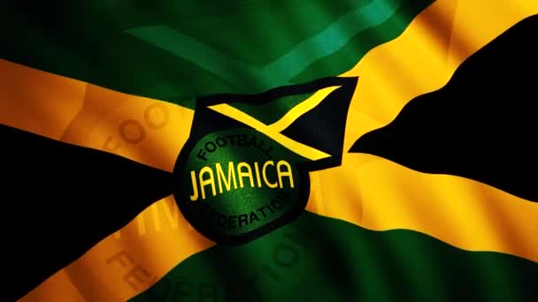 Bandera ondeante de la selección de fútbol de Jamaica. Moción. Fondo de la bandera ondeando 3d del país con el emblema del club de fútbol. Bandera de Jamaica selección de fútbol — Vídeo de stock