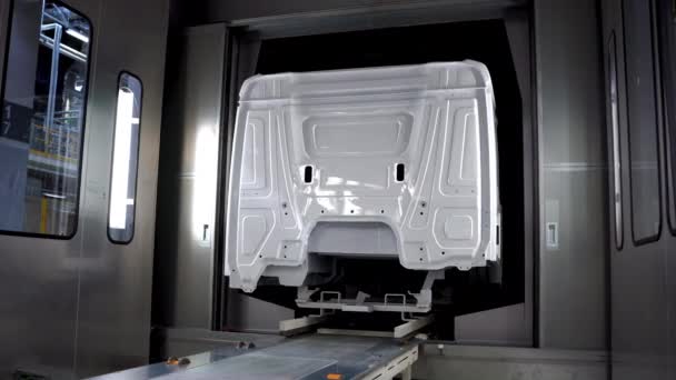 Process of truck car automated assembly, machine industry. Scene. Metal new parts of truck cars at the factory. — Video