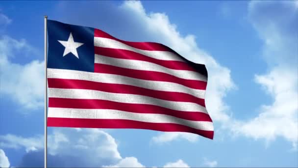 라이베리아의 국기가 푸른 하늘에 솜털 구름을 배경으로 흔들고 있습니다. 움직임. 줄무늬와 별 이달린 추상적 인 깃발 천 을 움직 이는 모습. — 비디오