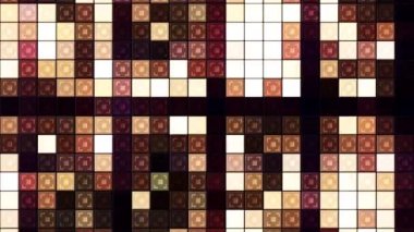 Parlak sarı geometrik şekiller. Hareket. Turuncu renkli küçük kareler parlıyor ve soyutlamada parıldıyor..