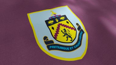 Burnley futbol kulübünün amblemiyle soyut dalgalanan bayrak. Hareket. İngiltere 'deki futbol kulüplerinin bayrakları. Sadece yazı işleri için..