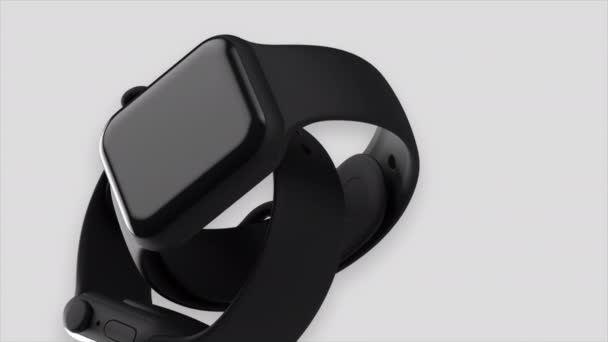 Nahaufnahme eines schwarzen Armbands mit abstrakten Uhren auf weißem Hintergrund. Bewegung. Neues modernes Smart-Watch-Gerät. — Stockvideo