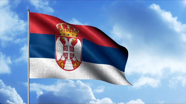 Vlag van Servië. Beweging De wind blaast de vlag in de blauwe lucht met wolken. — Stockfoto