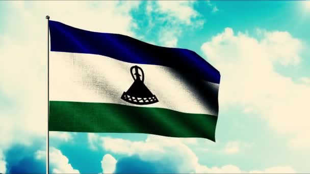 Η σημαία του Βασιλείου του Λεσότο. Κίνηση. Μια φωτεινή σημαία τρίχρωμη με ασπρόμαυρη και πράσινη ρίγα . — Αρχείο Βίντεο