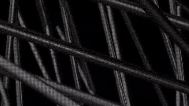 Siyah arka plan. Hareket. Gri çizgiler 3 boyutlu soyutlamalar. Binalar gibi yapılıyorlar ve farklı yönlere hareket ediyorlar..