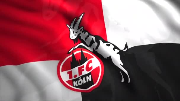 Close-up geanimeerd naadloos lussen zwaaiende vlag van de Duitse professionele voetbalclub in Keulen. Beweging. Het begrip sport. Uitsluitend voor redactioneel gebruik. — Stockvideo
