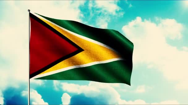 De vlag van de staat Guyana wappert in de wind tegen een blauwe lucht met wolken. Beweging. Contrasterende vlag tegen blauwe bewolkte lucht. — Stockvideo