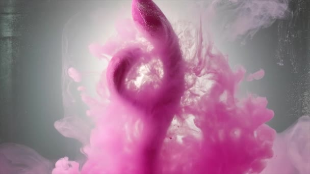 Primer plano de vibrante juguete sexual rosa bajo el agua con pintura rosa extendida. Creativo. Concepto de amor propio y placer. — Vídeos de Stock
