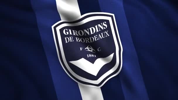 Zbliżenie flagi FC Girondins de Bordeaux, płynna pętla. - Wniosek. Symbolem francuskiego klubu piłkarskiego. Wyłącznie do użytku redakcyjnego. — Wideo stockowe