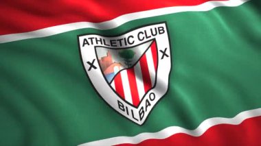 Athletic Bilbao futbol kulübü logosunun olduğu bayrak sallıyor. Hareket. Spor anlayışı ve ulusal gurur. Sadece yazı işleri için..