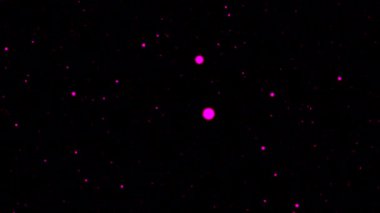 Siyah arkaplanda renkli parçacıkların akışı. Hareket. Renkli yuvarlaklar karanlık uzayda hareket eder. Dış uzayda yuvarlak enerji parçacıkları akışı